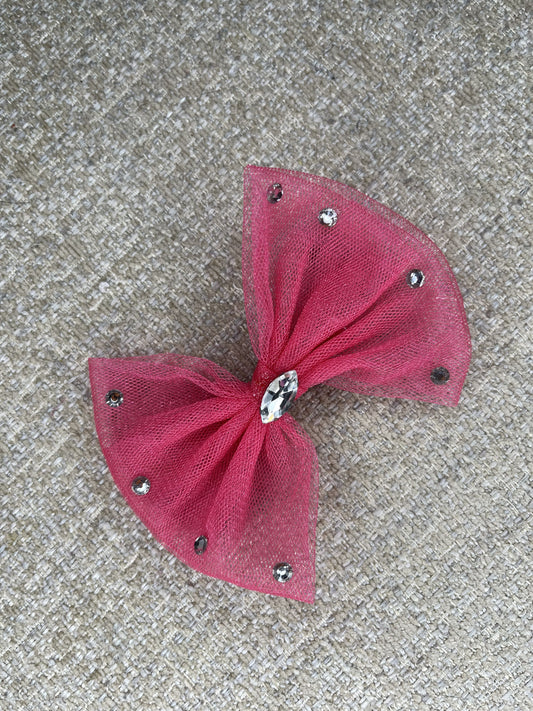 Pink bow with decorative elements