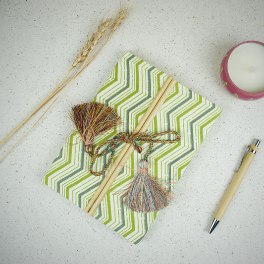 Chevron Pattern Green Diary styled flatlay with writing accessories