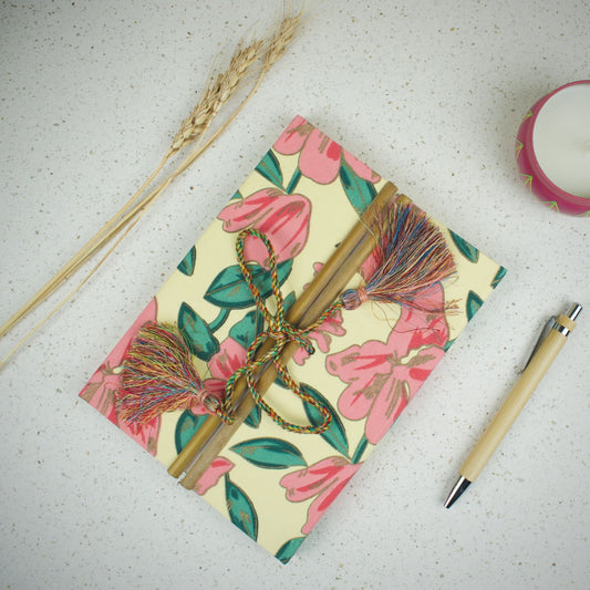 Tropical Floral Pink Diary styled flatlay with writing accessories