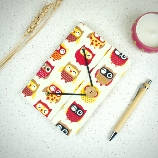 Owl Print Red Diary styled flatlay with writing accessories