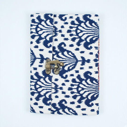 Navy Ikat lock diary on a plain background