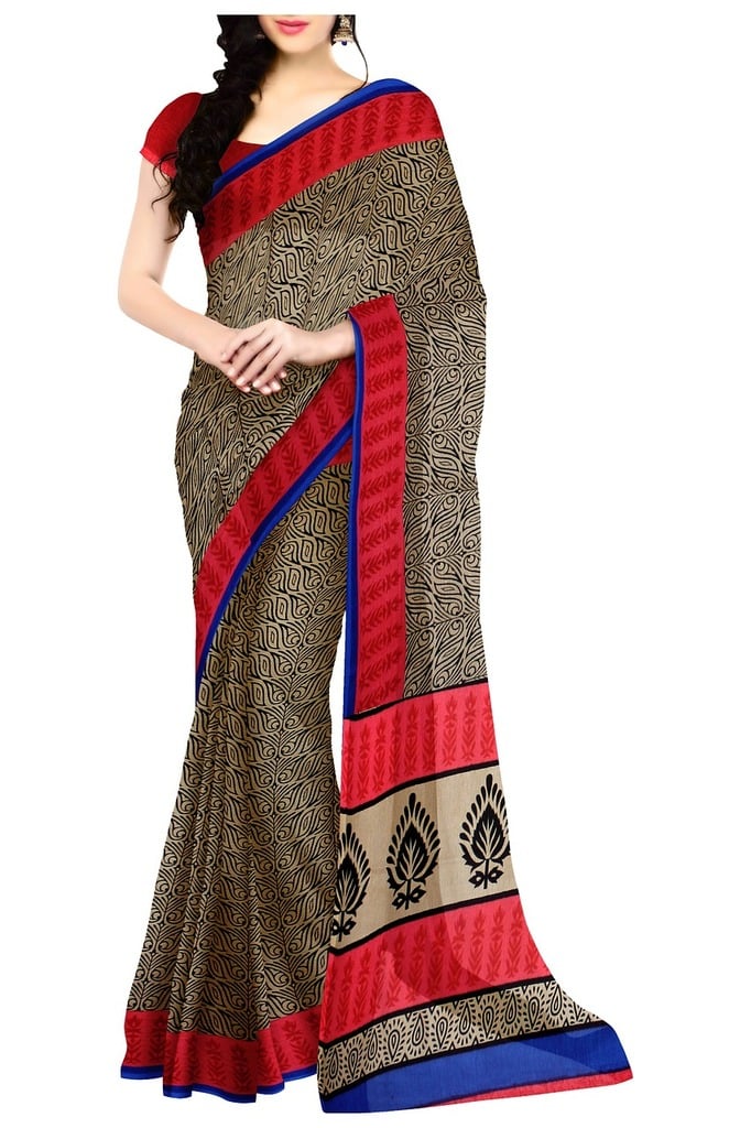 Beige color saree with red and blue border