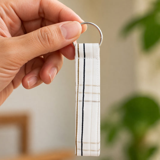 Beige Stripe keyring styled flatlay