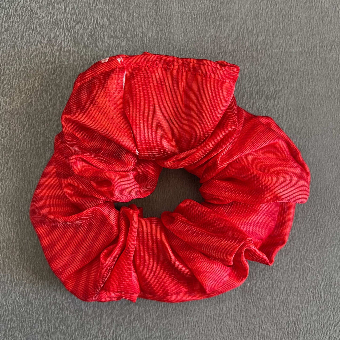 Bright red with a slight sheen, offering a pop of color with a classic touch