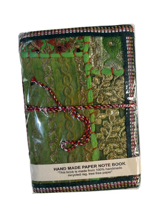 Handmade paper notebook with green embroidered cover