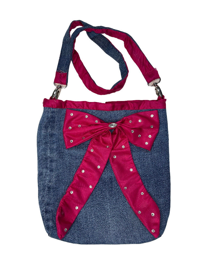 Denim drawstring bag with a large maroon bow