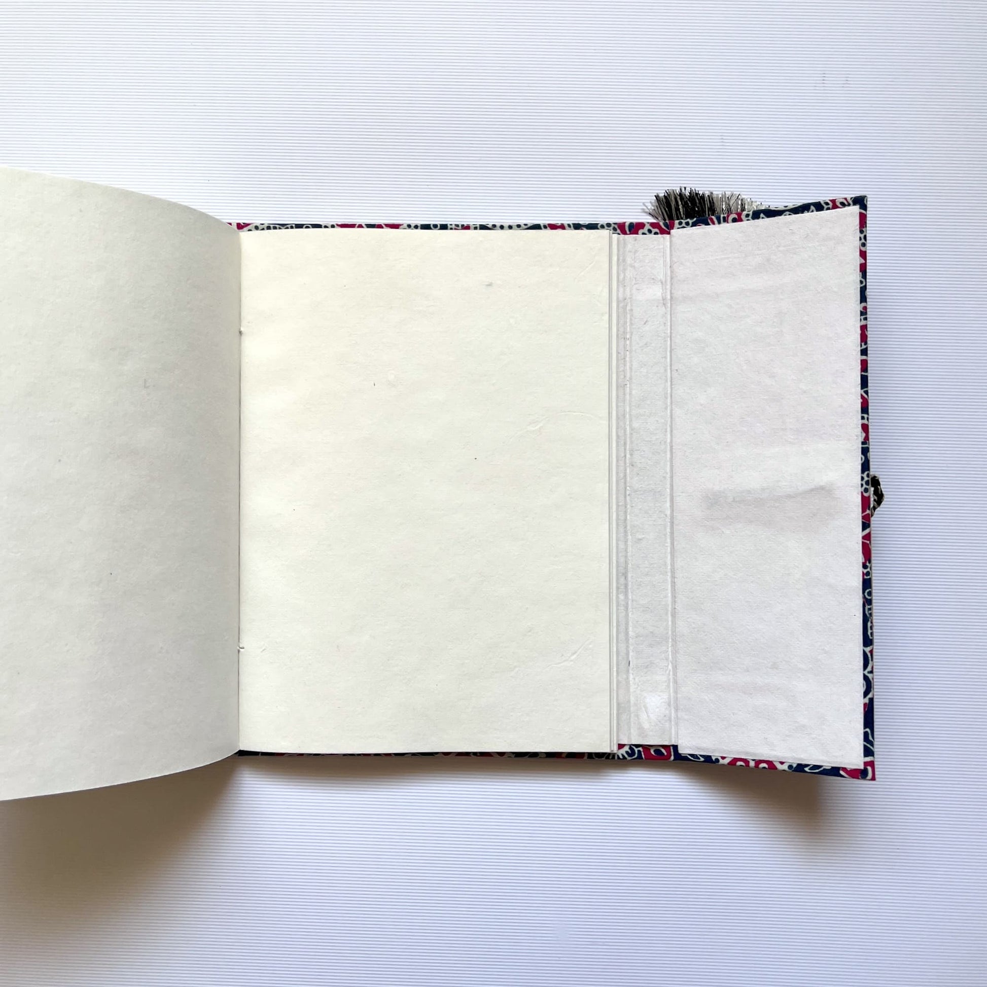 Mandala Floral Blue Pink Diary opened to show handmade paper pages