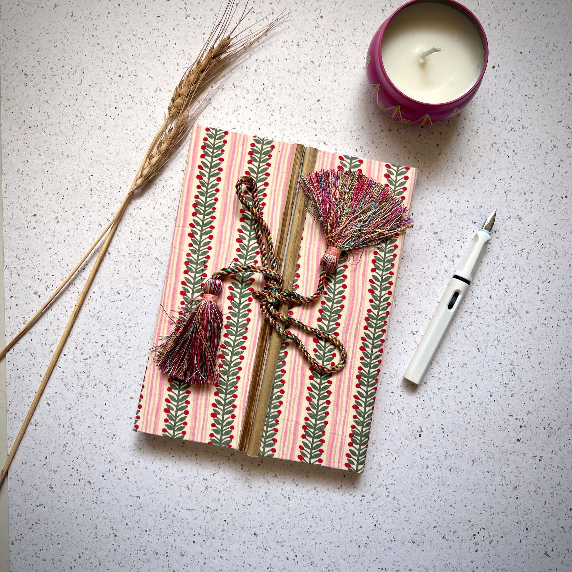 Berry Stripe Pink Diary styled flatlay with writing accessories