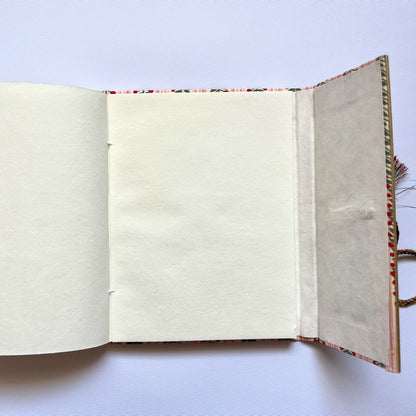 Berry Stripe Pink Diary opened to show handmade paper pages
