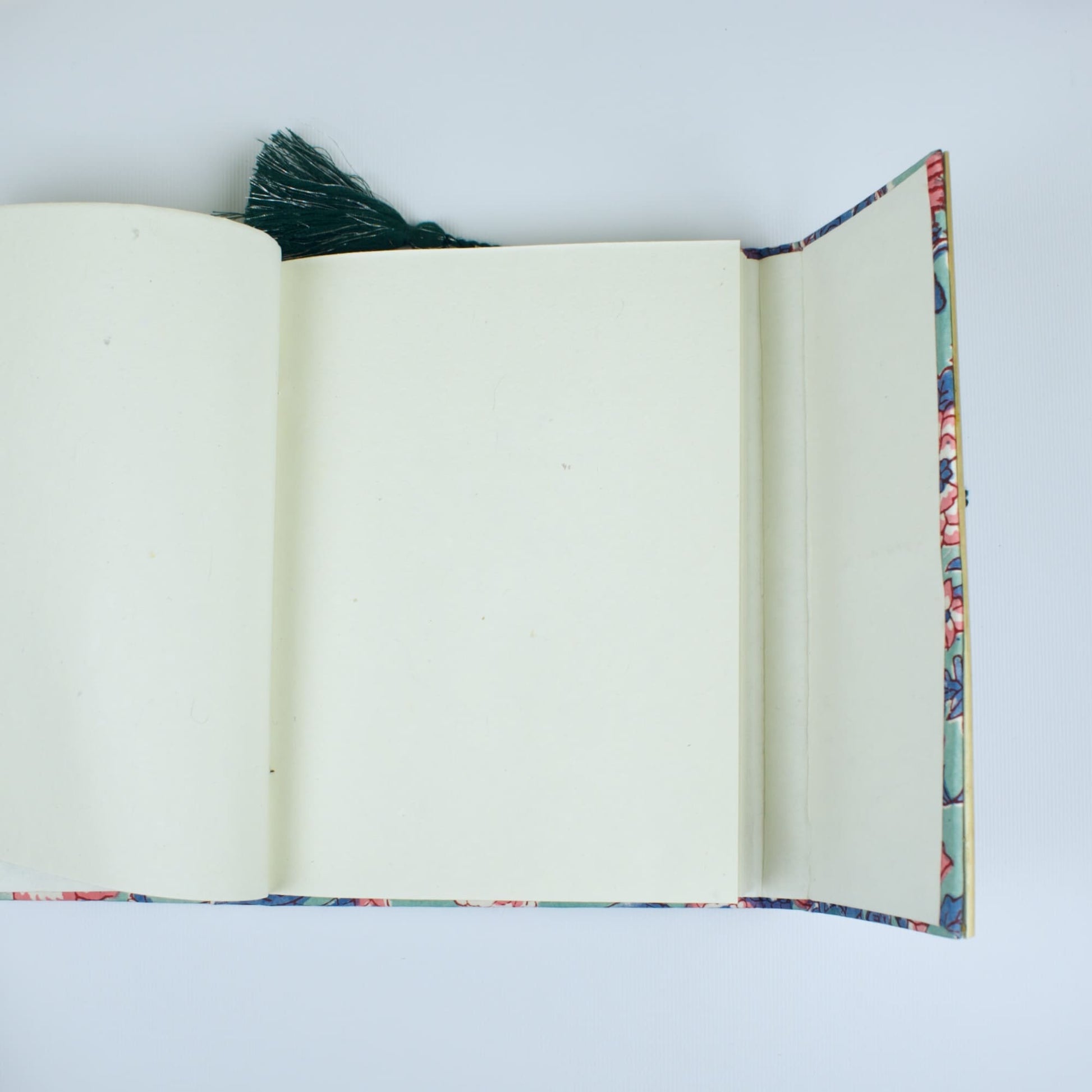 Mandala Floral Blue Diary opened to show handmade paper pages