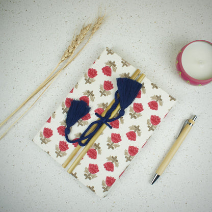 Block Floral Red Diary styled flatlay with writing accessories