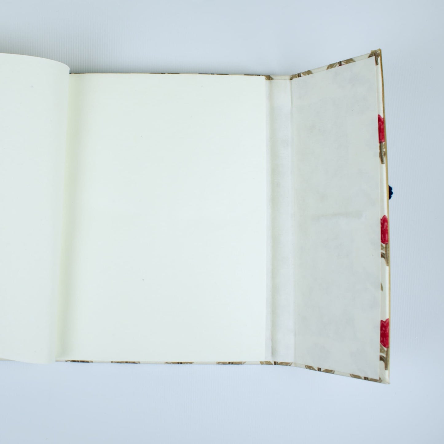 Block Floral Red Diary opened to show handmade paper pages