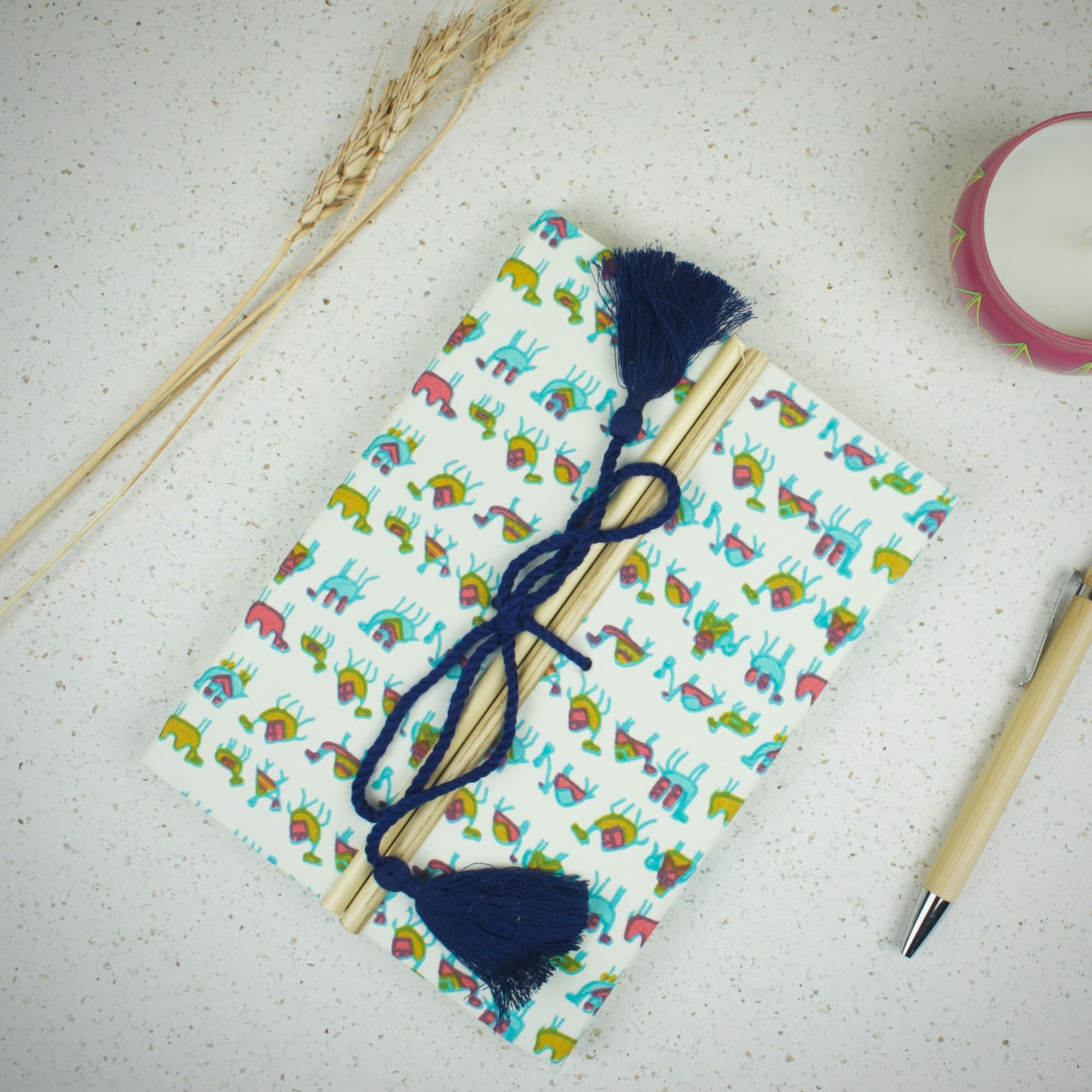 Camel Print Blue Diary styled flatlay with writing accessories