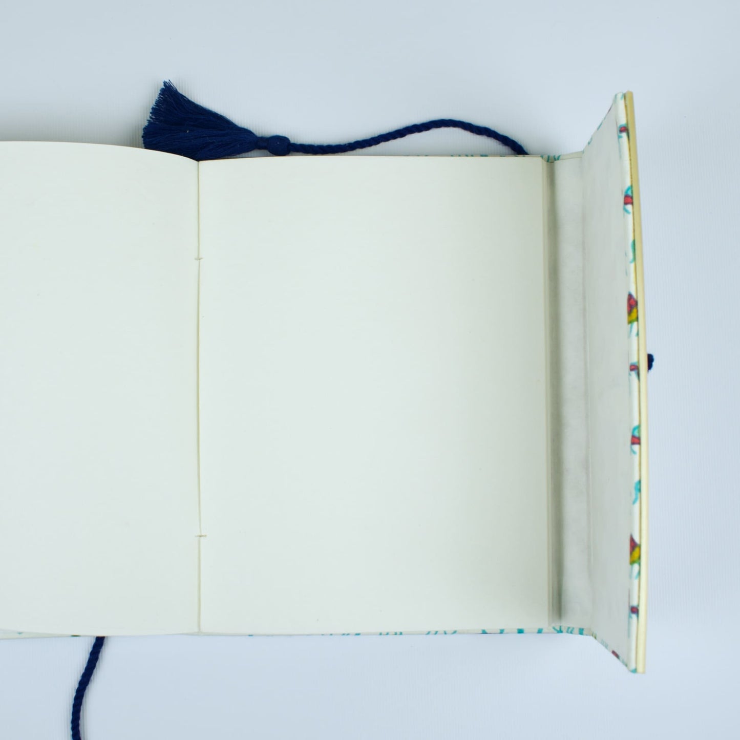 Camel Print Blue Diary opened to show handmade paper pages