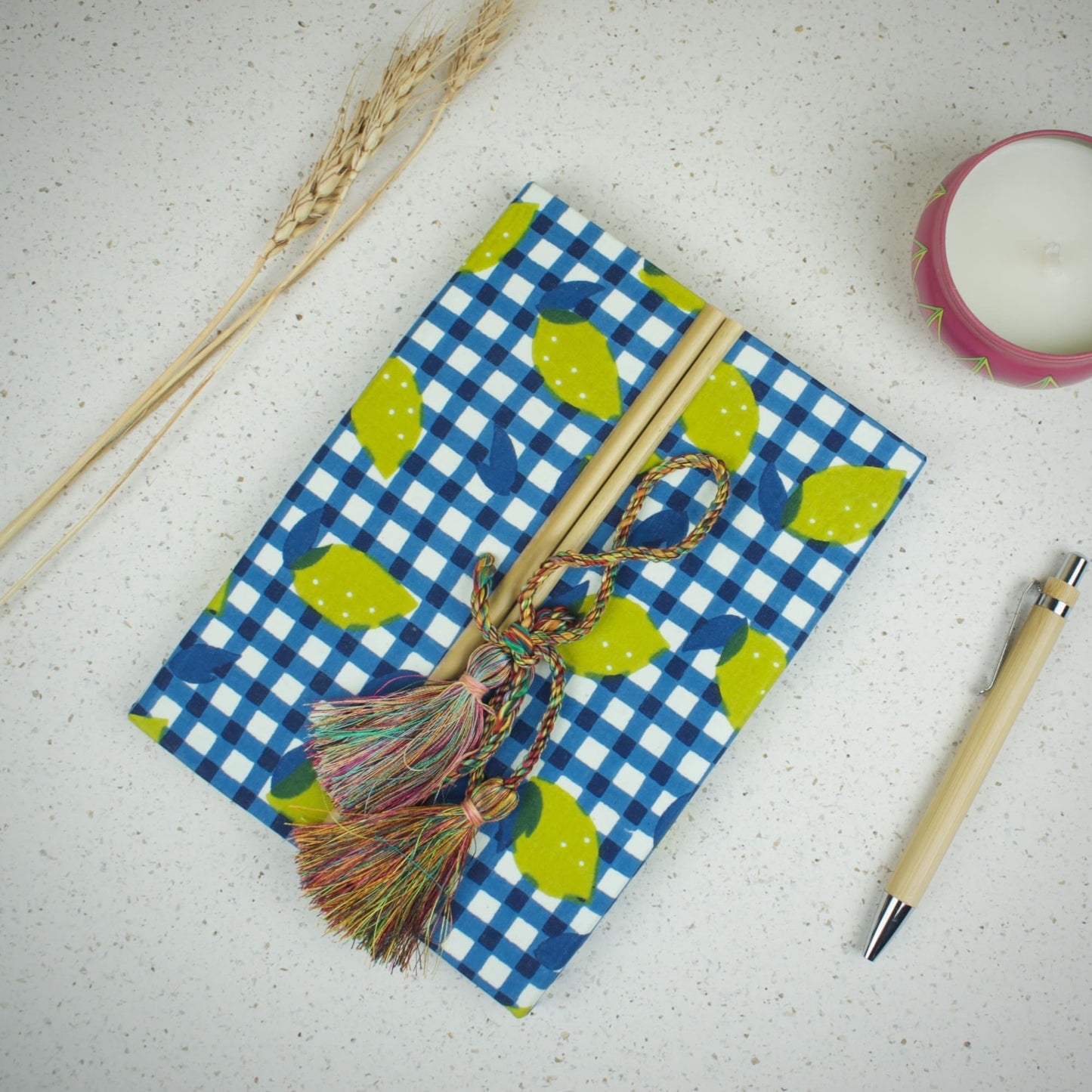 Check Leaf Blue Diary styled flatlay with writing accessories