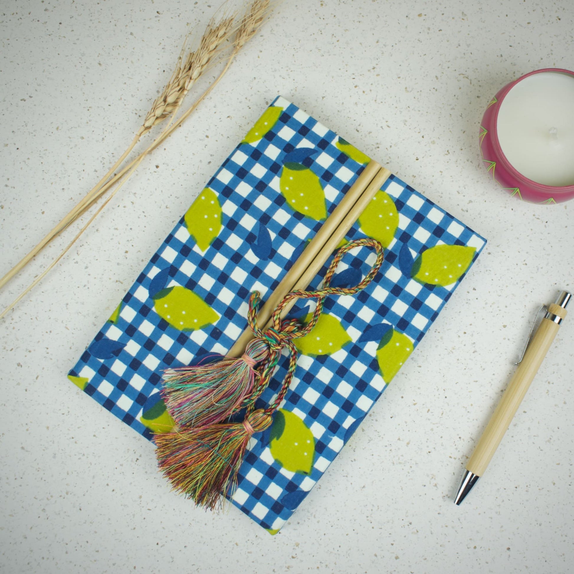 Check Leaf Blue Diary styled flatlay with writing accessories