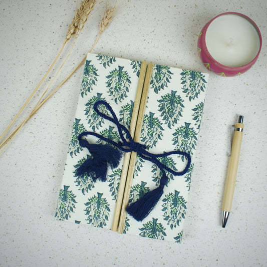 Botanical Leaf Green Diary styled flatlay with writing accessories