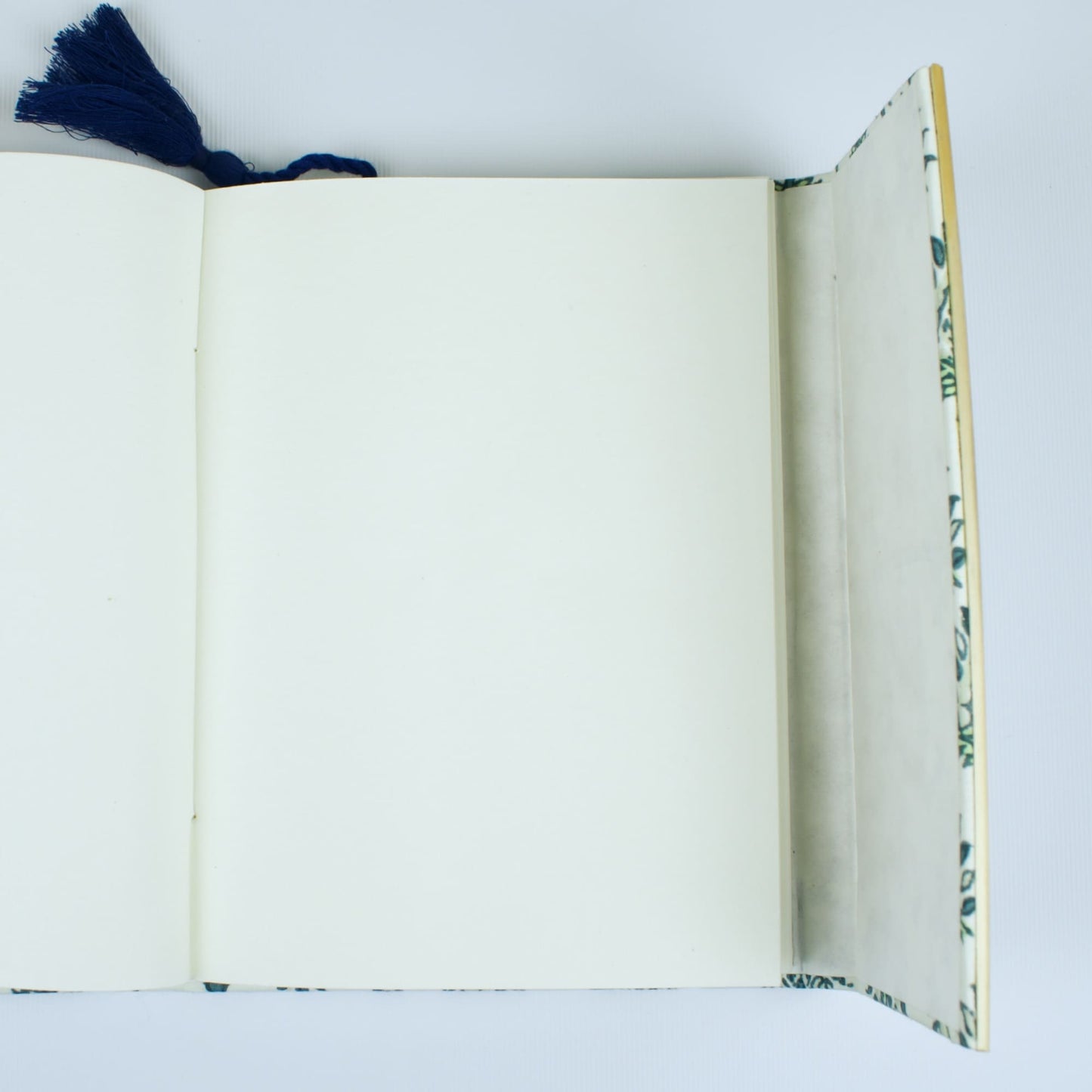 Botanical Leaf Green Diary opened to show handmade paper pages