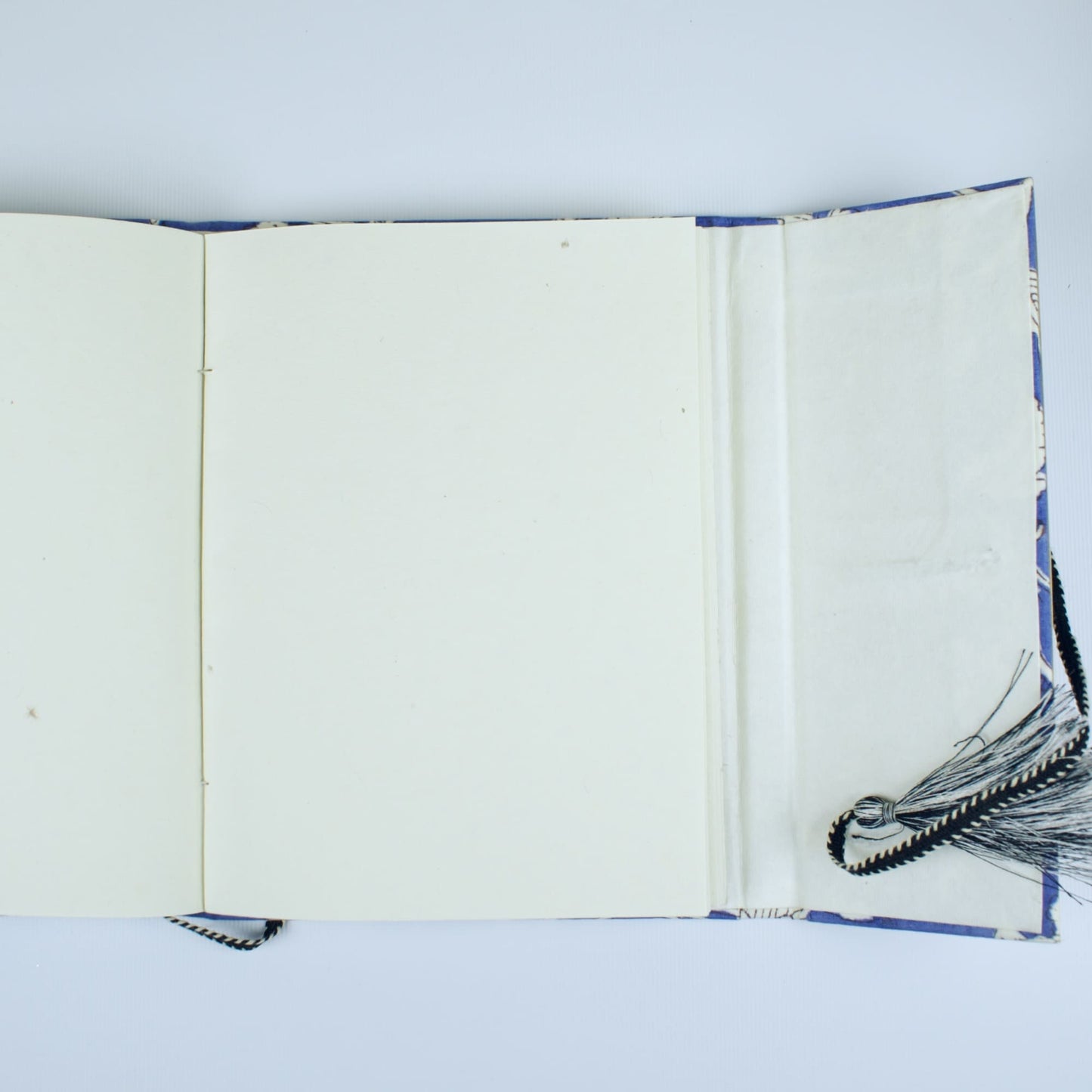 Floral Vine Blue Diary opened to show handmade paper pages