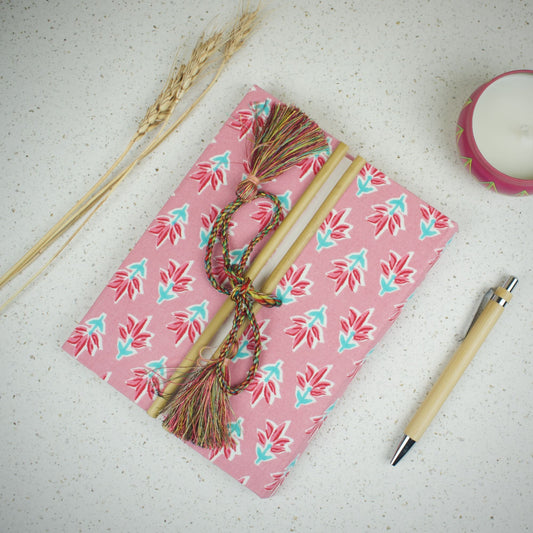 Block Floral Pink Diary styled flatlay with writing accessories