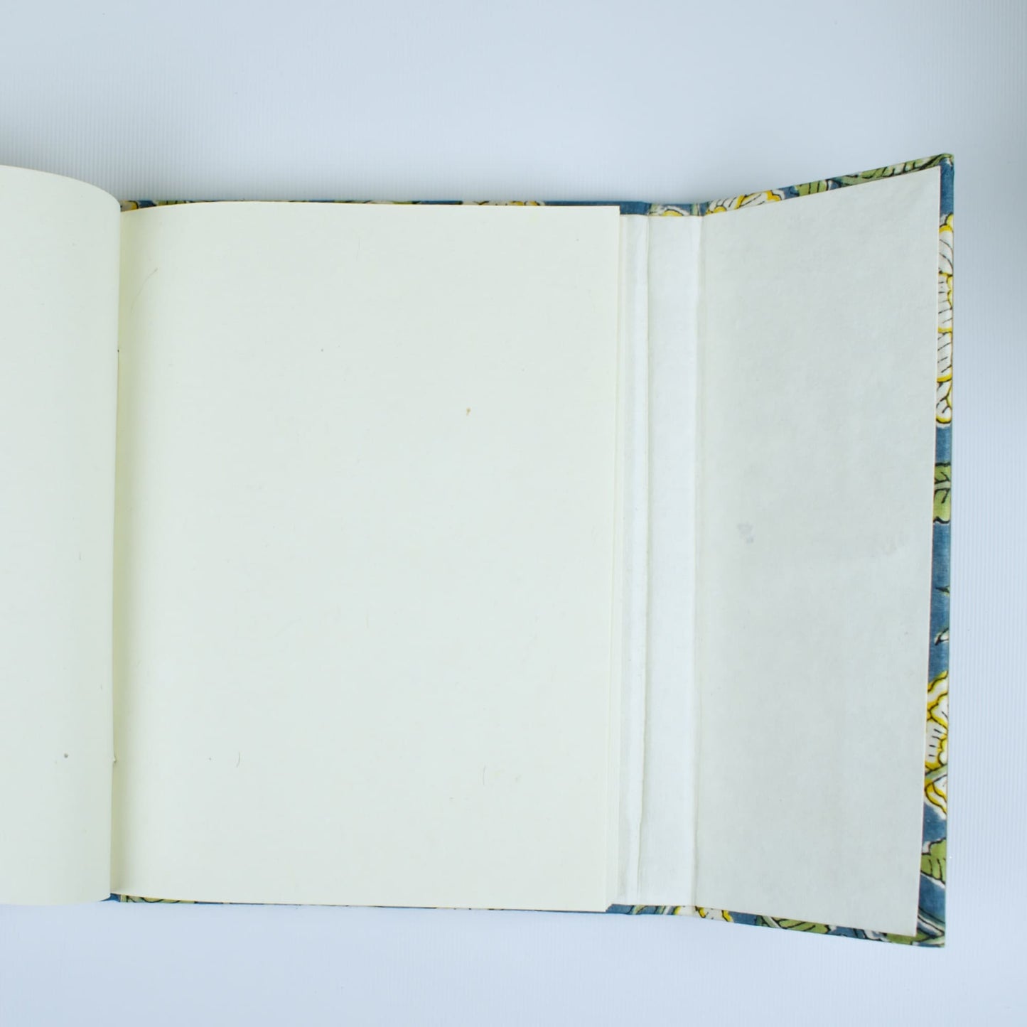 Mughal Floral Blue Diary opened to show handmade paper pages
