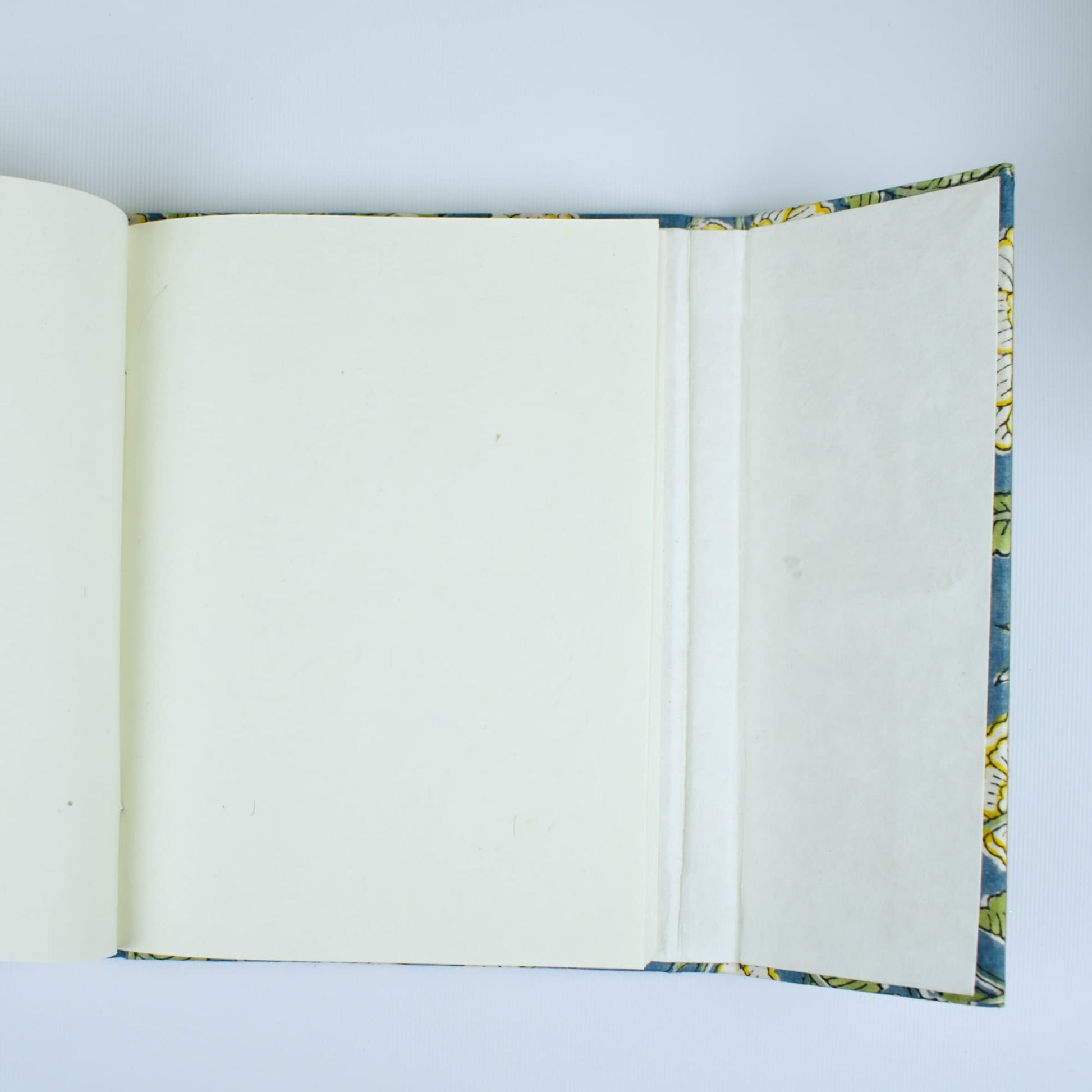 Mughal Floral Blue Diary opened to show handmade paper pages
