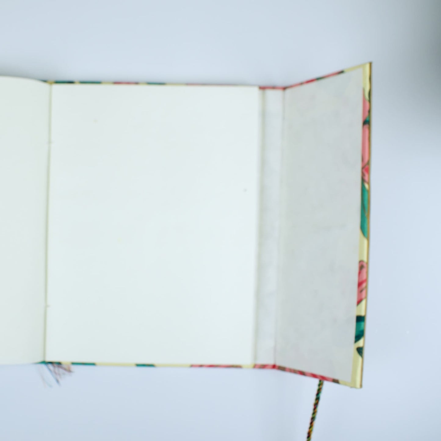 Tropical Floral Pink Diary opened to show handmade paper pages