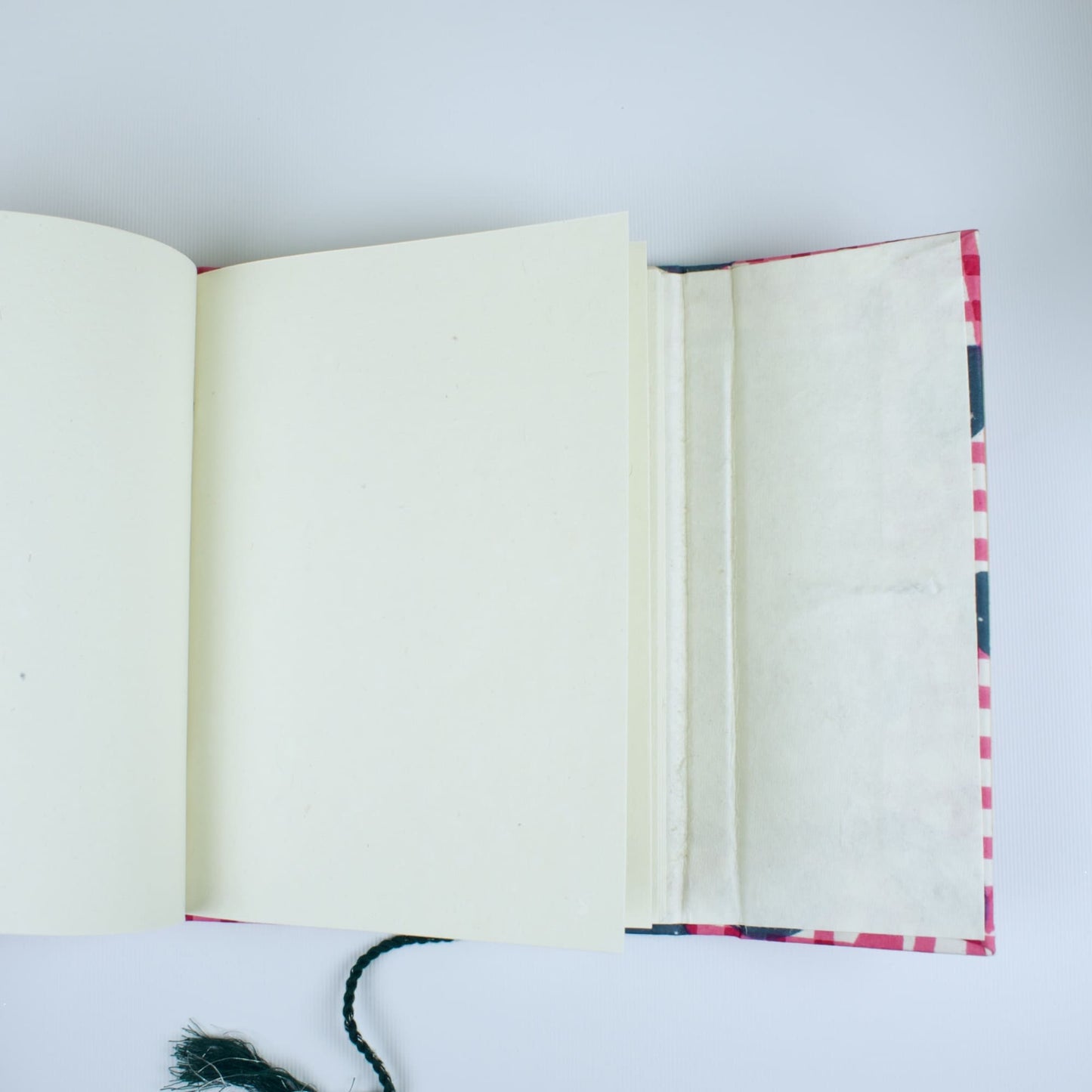 Gingham Check Pink Diary opened to show handmade paper pages