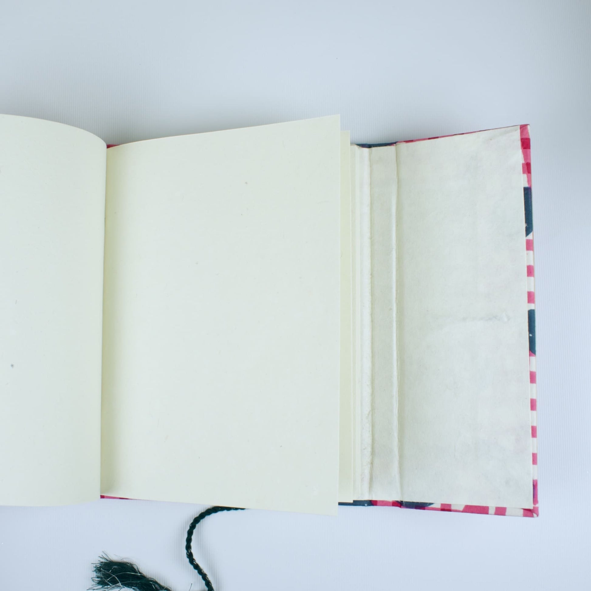 Gingham Check Pink Diary opened to show handmade paper pages