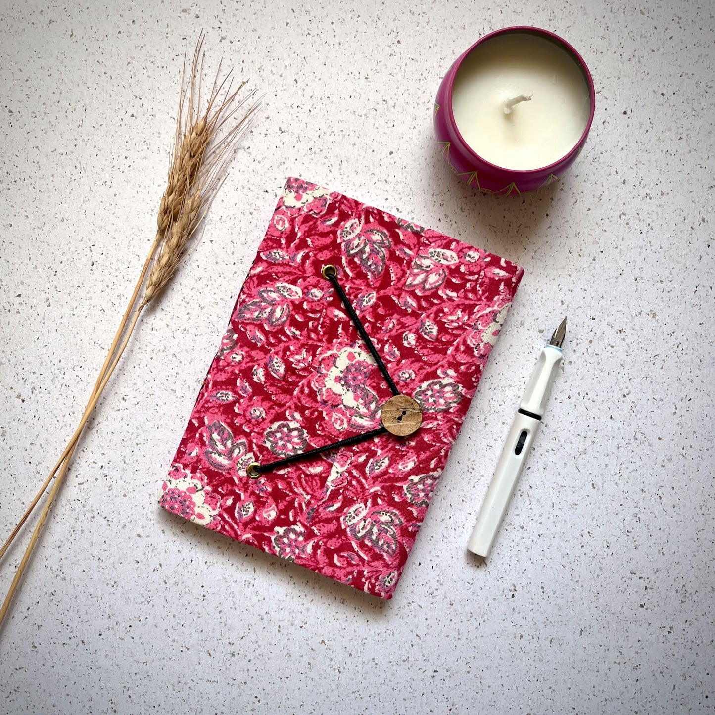 Paisley Floral Pink Diary styled flatlay with writing accessories