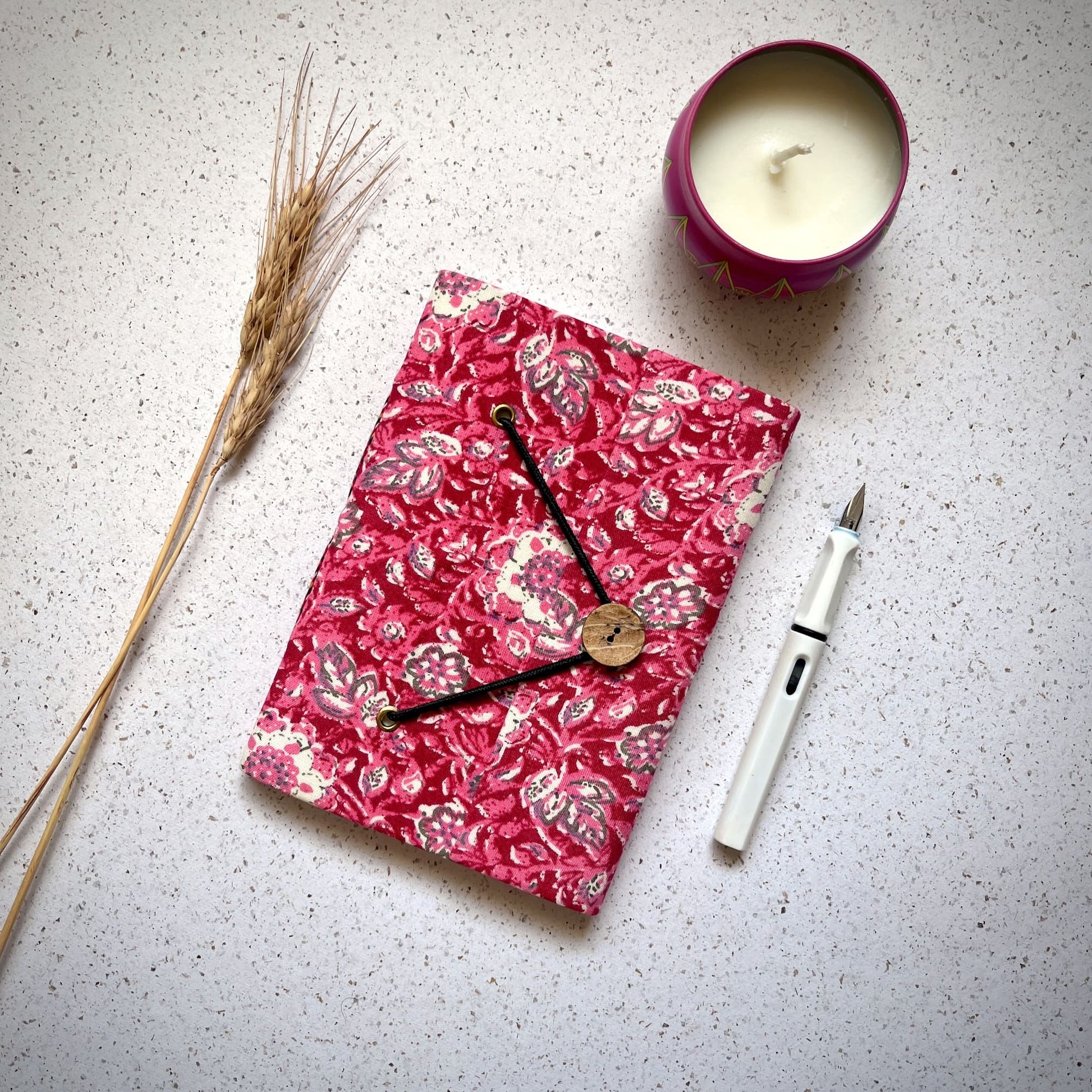 Paisley Floral Pink Diary styled flatlay with writing accessories