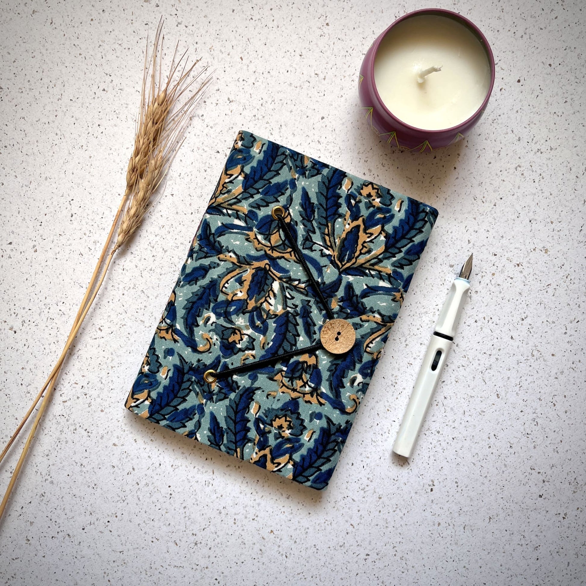 Botanical Floral Blue Diary styled flatlay with writing accessories