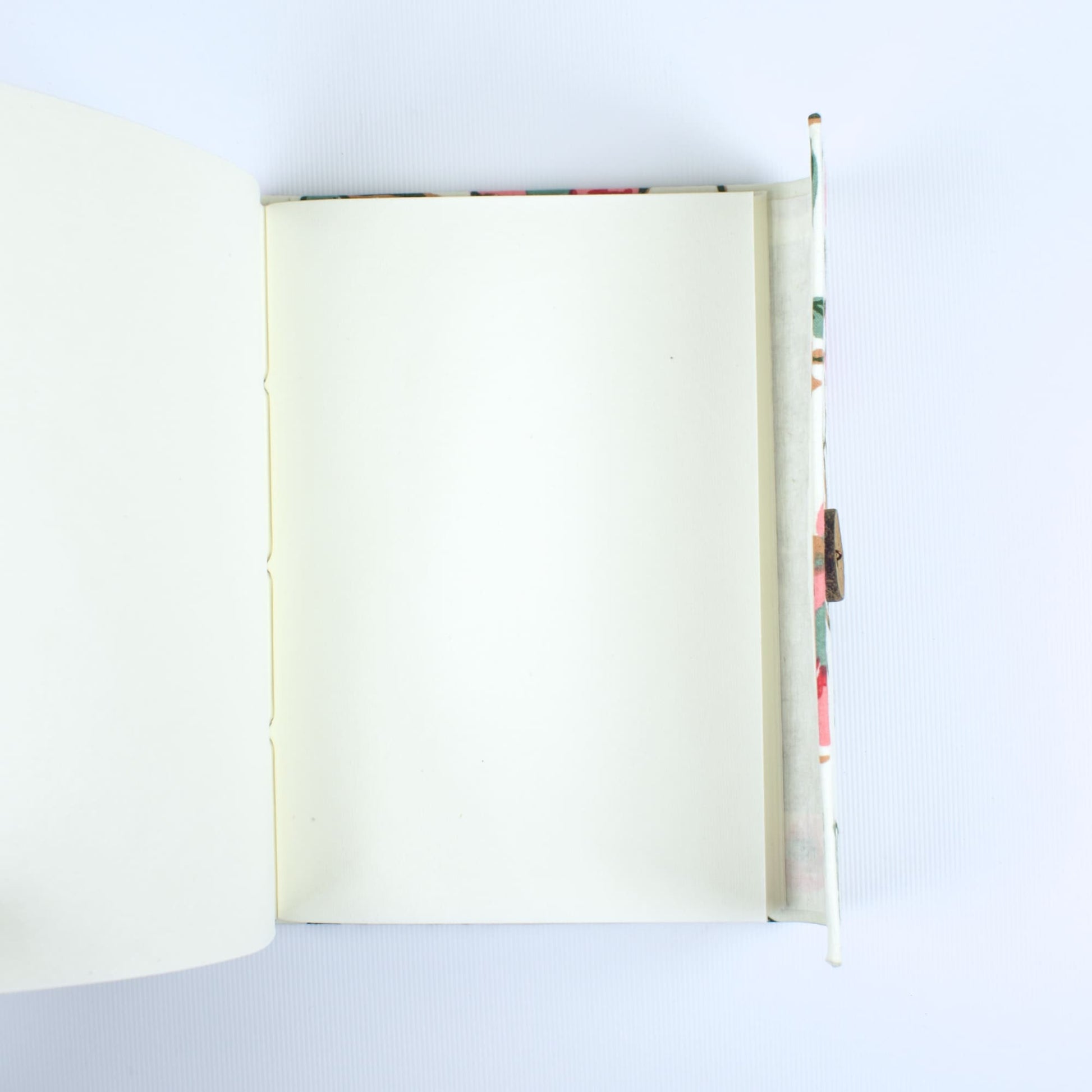Floral Vine Off White Diary opened to show handmade paper pages