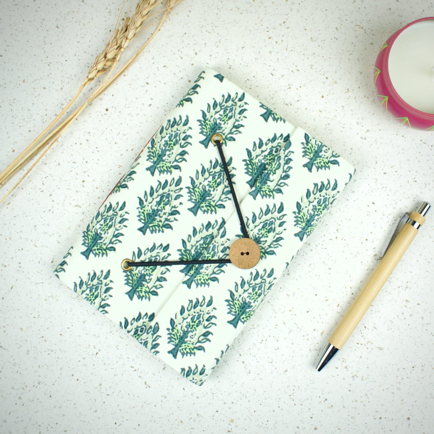 Leaf Print Green Diary styled flatlay with writing accessories