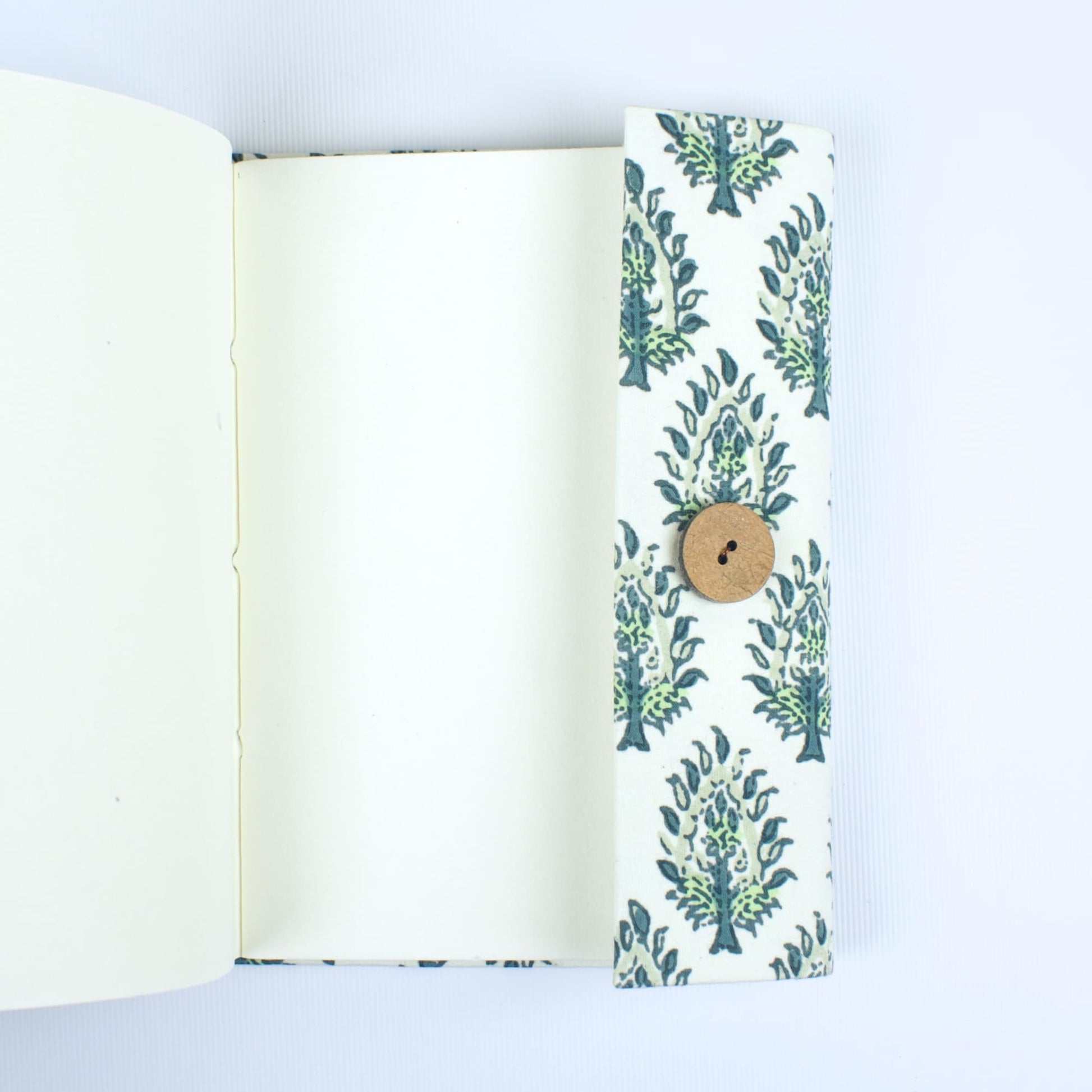 Leaf Print Green Diary opened to show handmade paper pages