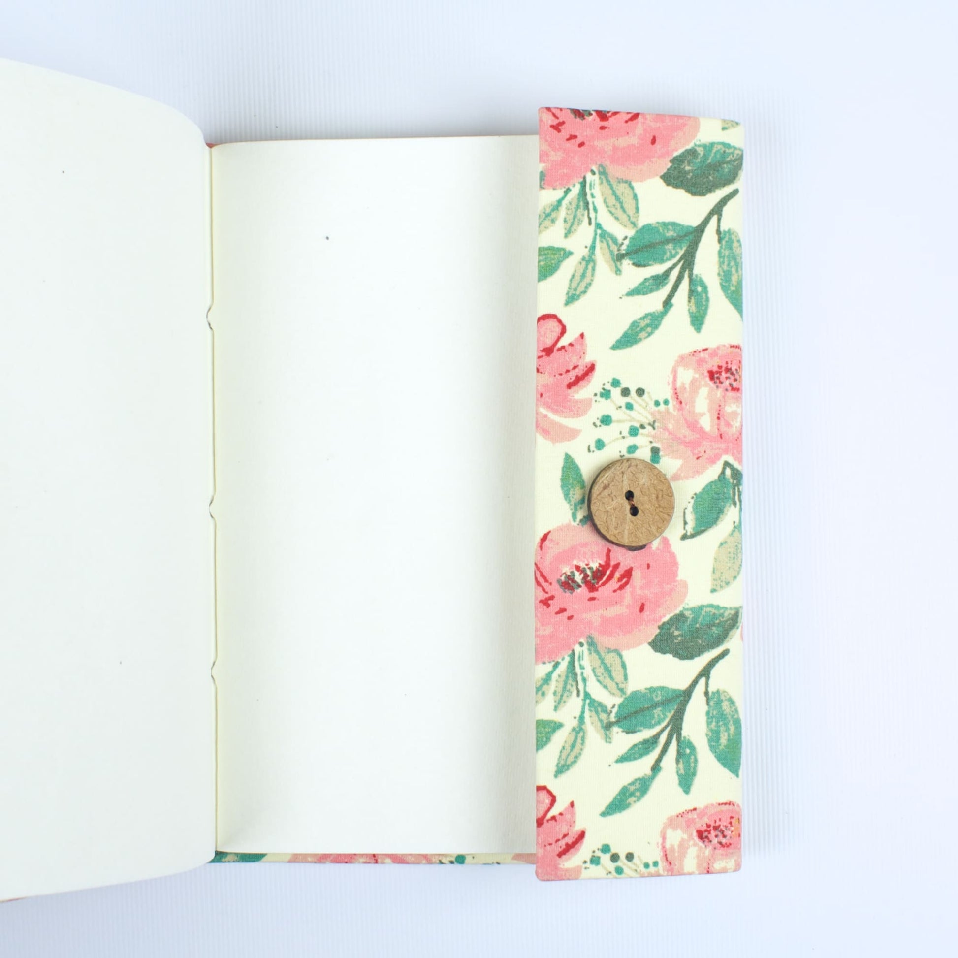 Paisley Floral Pink Diary opened to show handmade paper pages