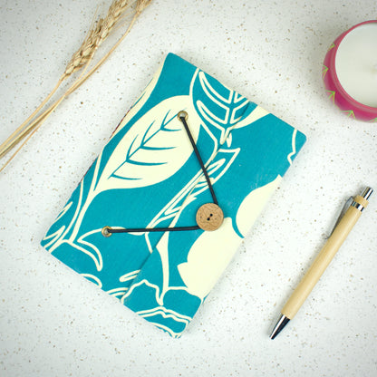 Modern Leaf Blue Diary styled flatlay with writing accessories