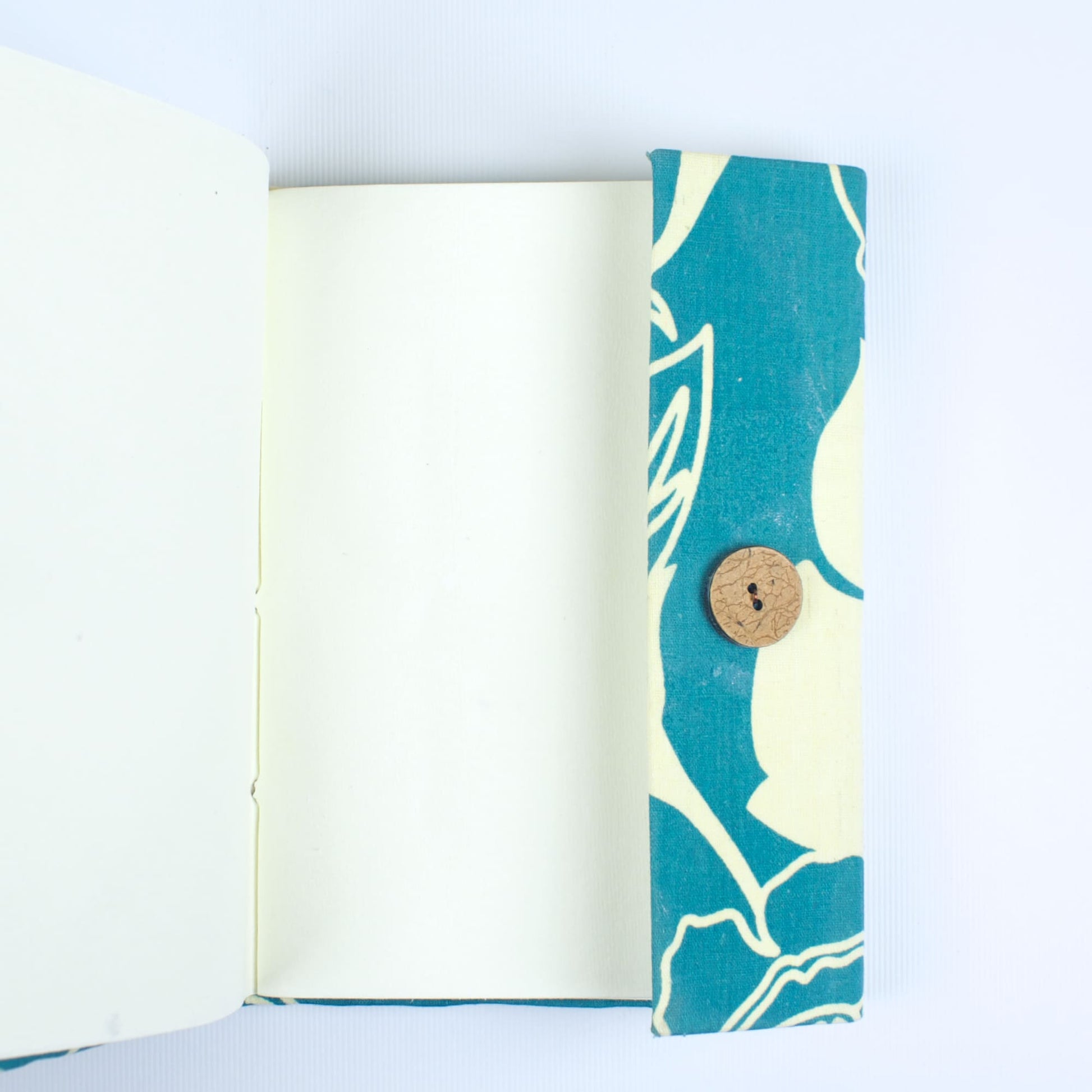 Modern Leaf Blue Diary opened to show handmade paper pages