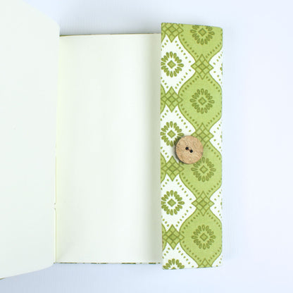 Geometric Green Diary opened to show handmade paper pages