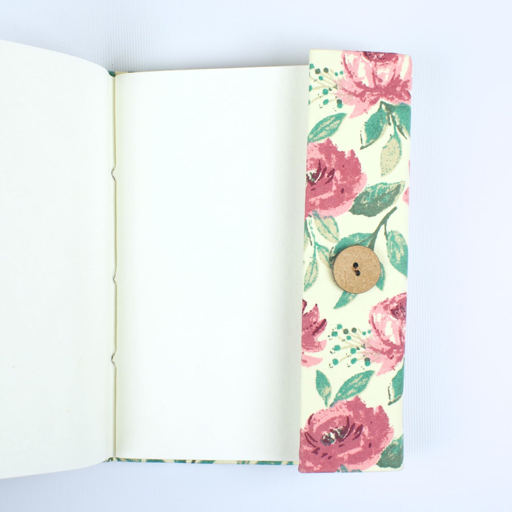Rose Floral Pink Diary opened to show handmade paper pages