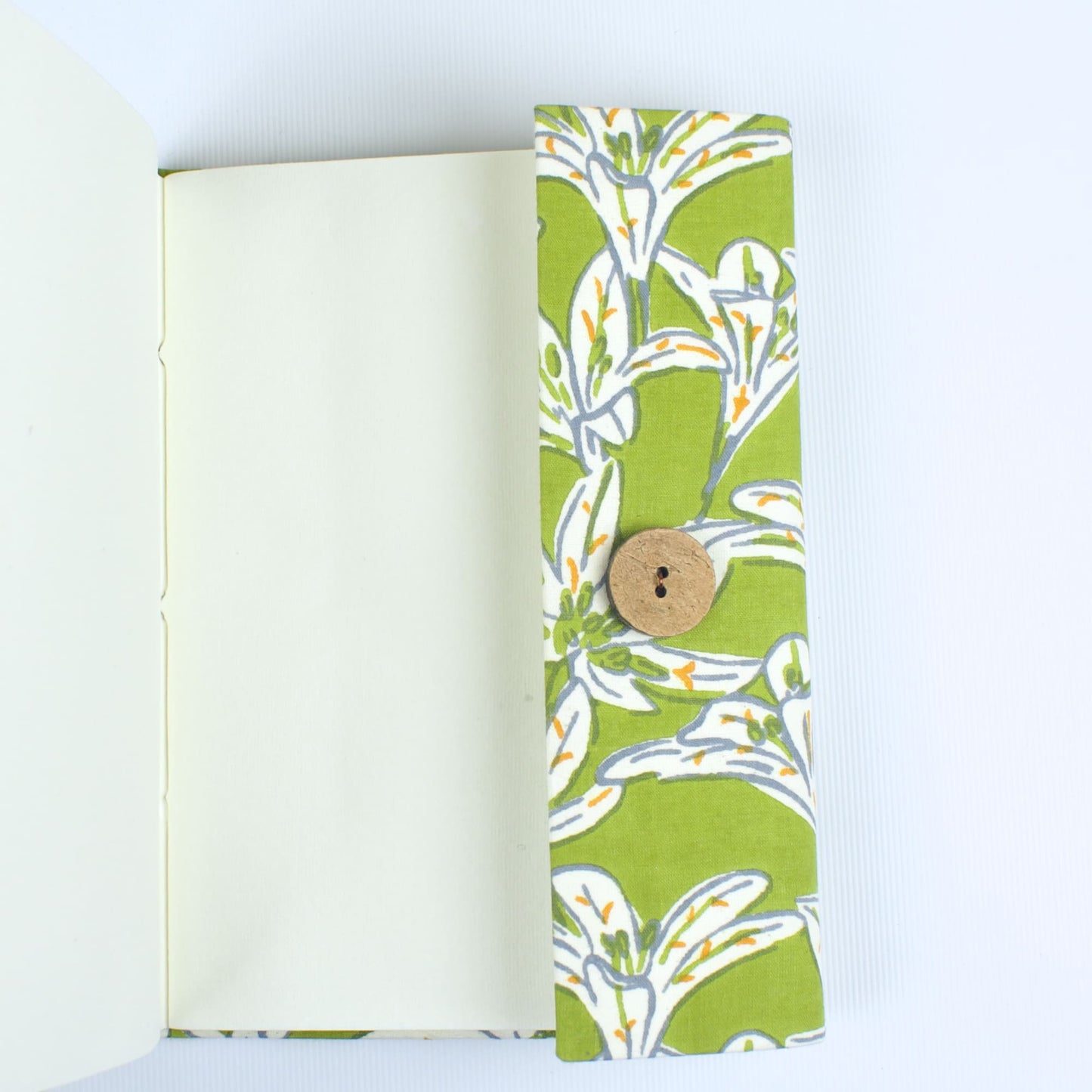 Tropical Leaf Green Diary opened to show handmade paper pages