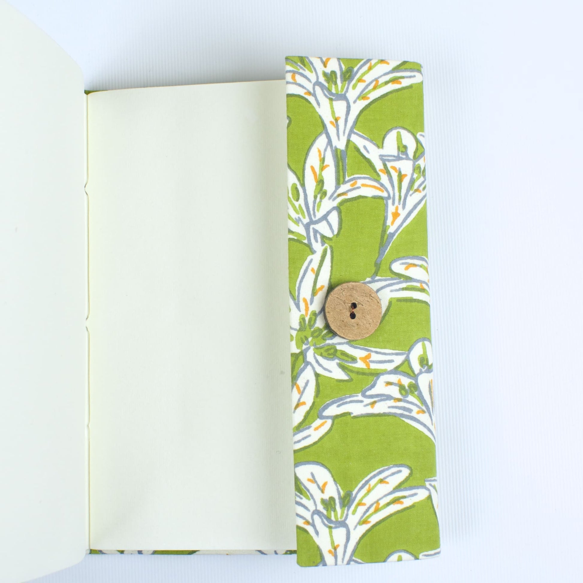 Tropical Leaf Green Diary opened to show handmade paper pages
