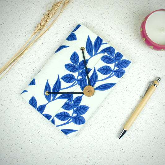 Botanical Blue Diary styled flatlay with writing accessories