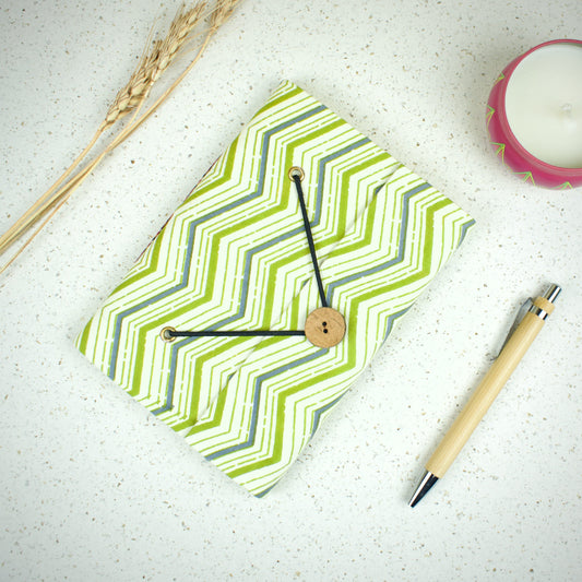 Chevron Green Diary styled flatlay with writing accessories