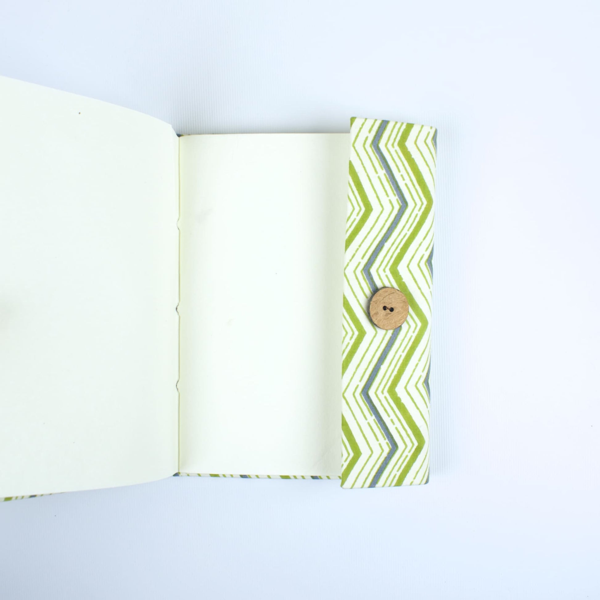 Chevron Green Diary opened to show handmade paper pages