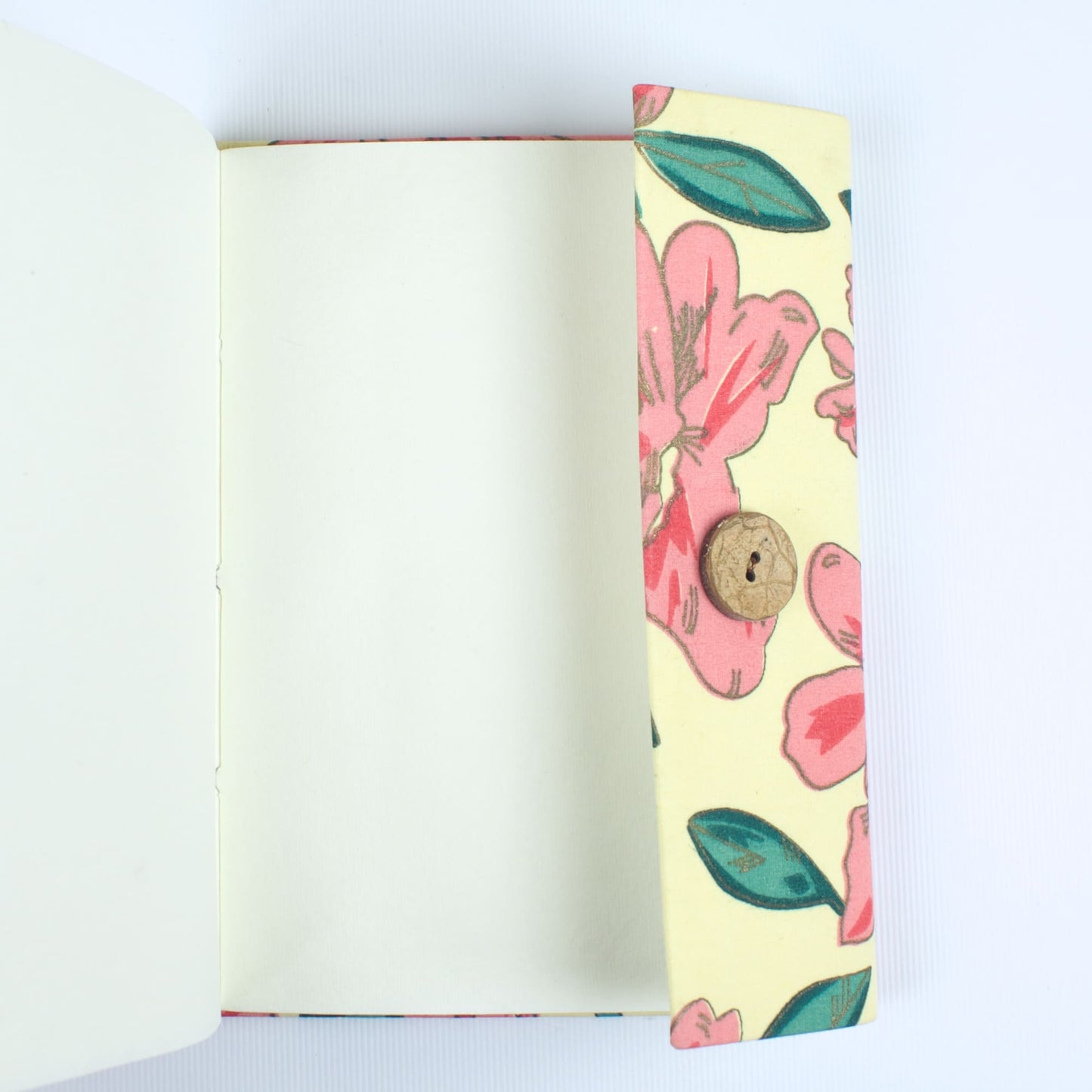Floral Bloom Pink Diary opened to show handmade paper pages