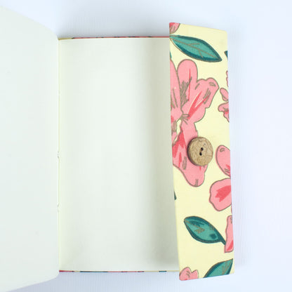 Floral Bloom Pink Diary opened to show handmade paper pages