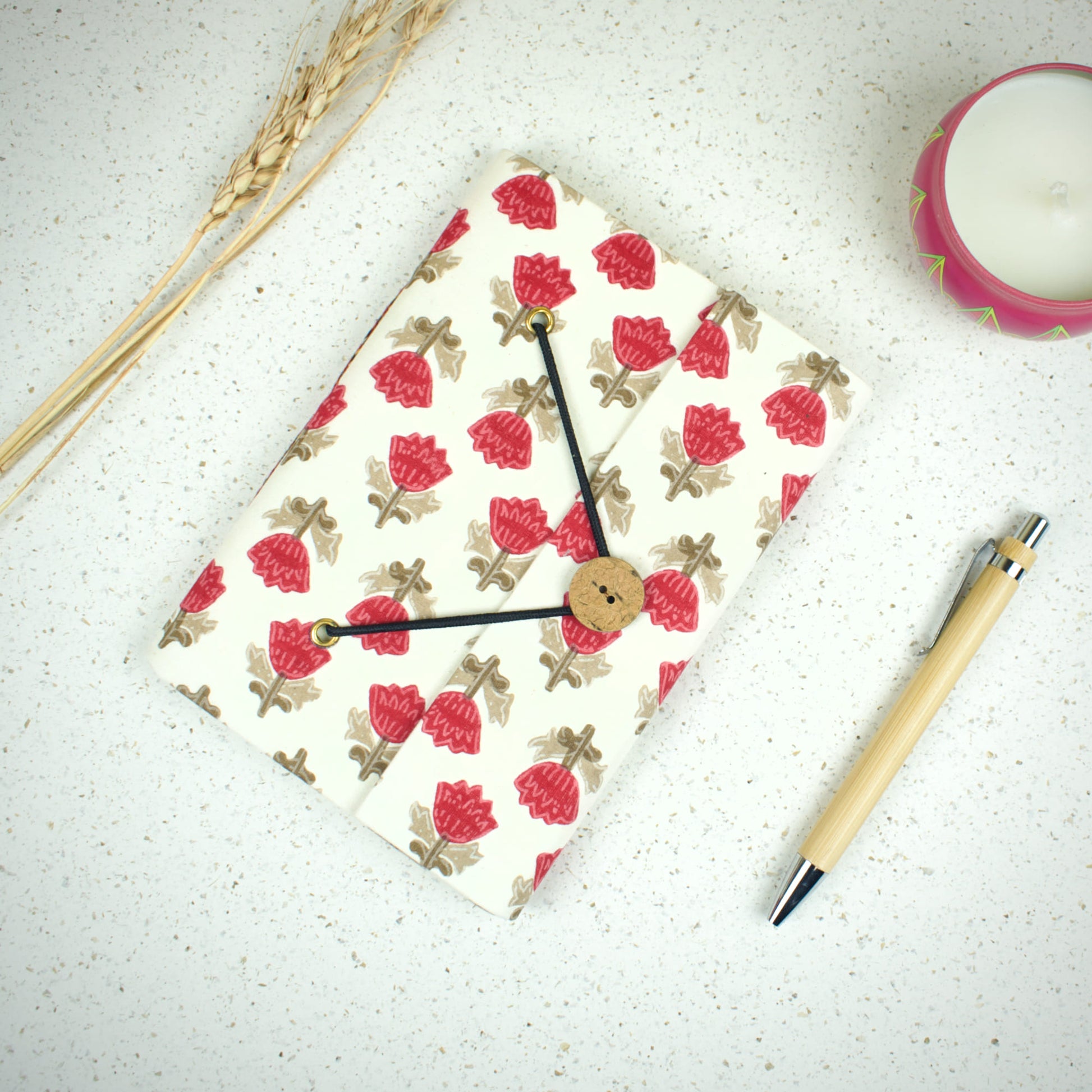 Block Print Red Diary styled flatlay with writing accessories