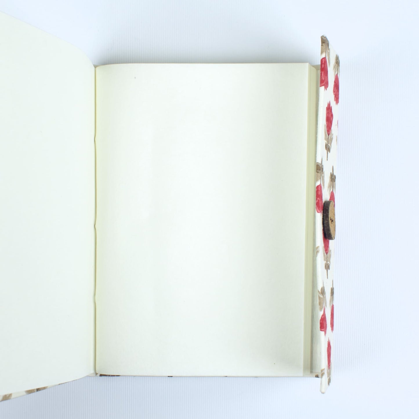 Block Print Red Diary opened to show handmade paper pages