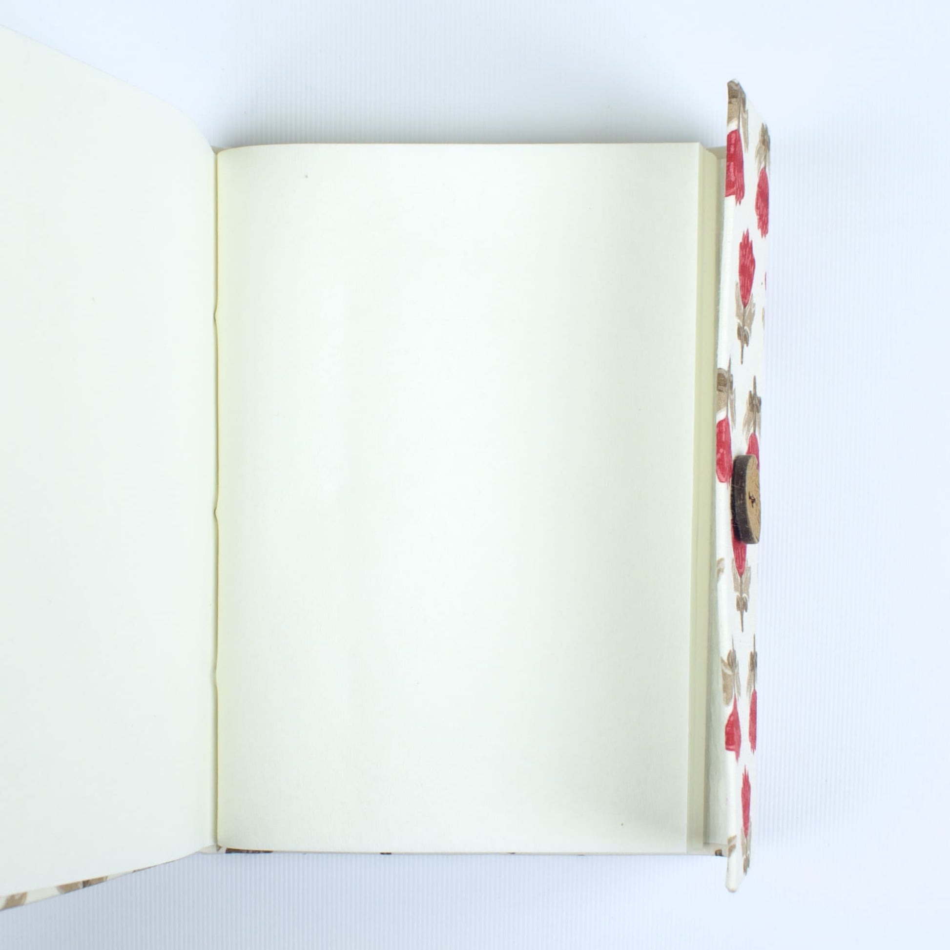 Block Print Red Diary opened to show handmade paper pages